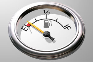 Photo of a fuel gauge, with the needle pointing to empty